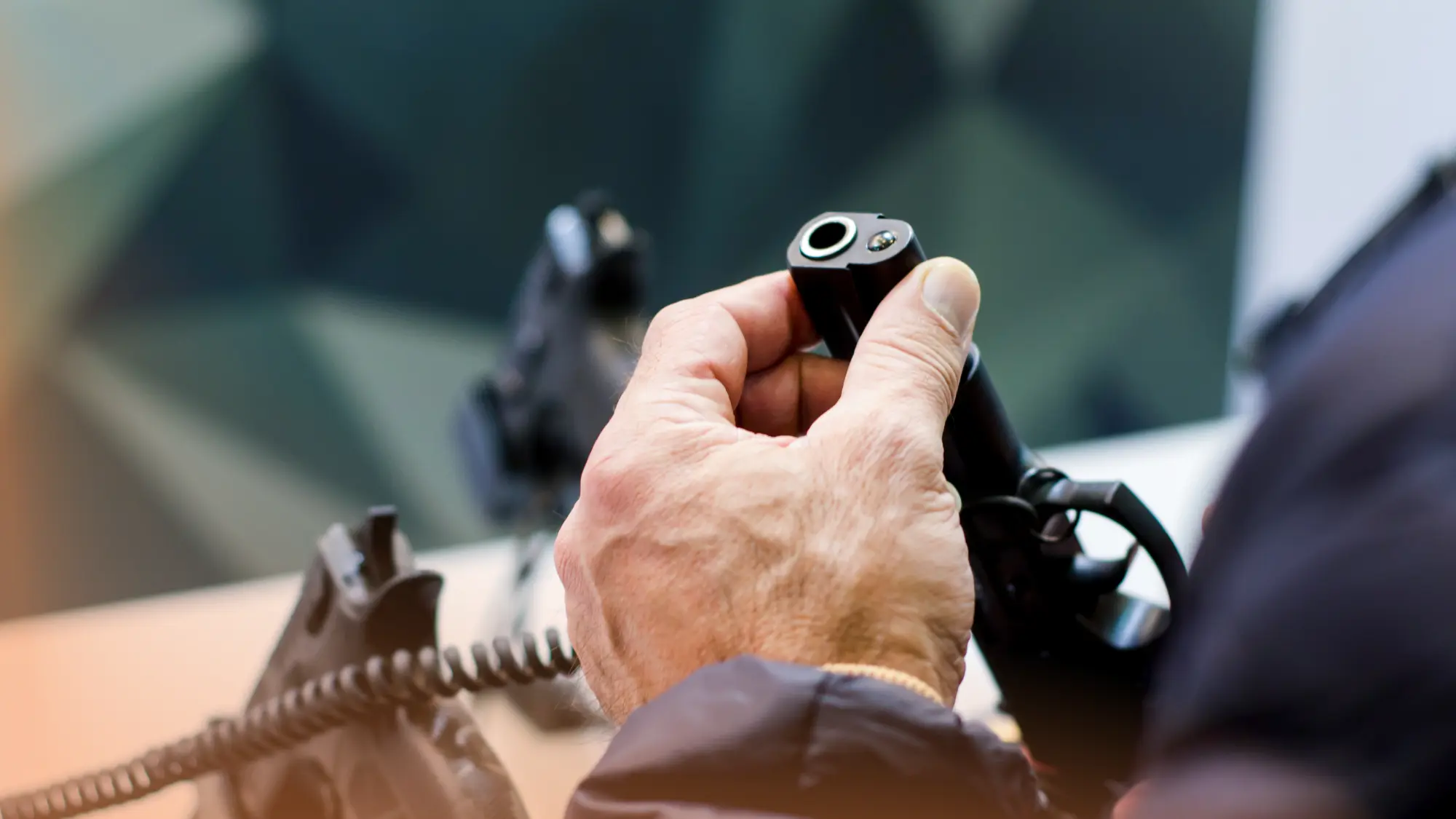 Vantage Point Firearms, Range, and Training Center logo against a backdrop of shooting range, representing excellence in firearms training and experiences in New London CT.